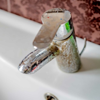 Verkalkter Wasserhahn